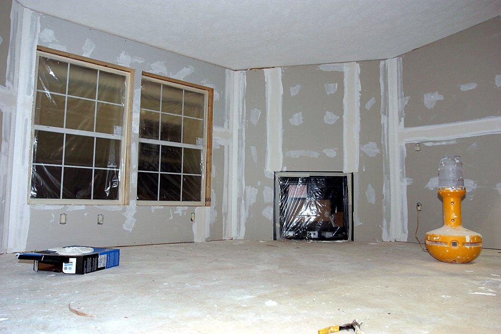 Room with a second, wider coat of compound on every seam and screw